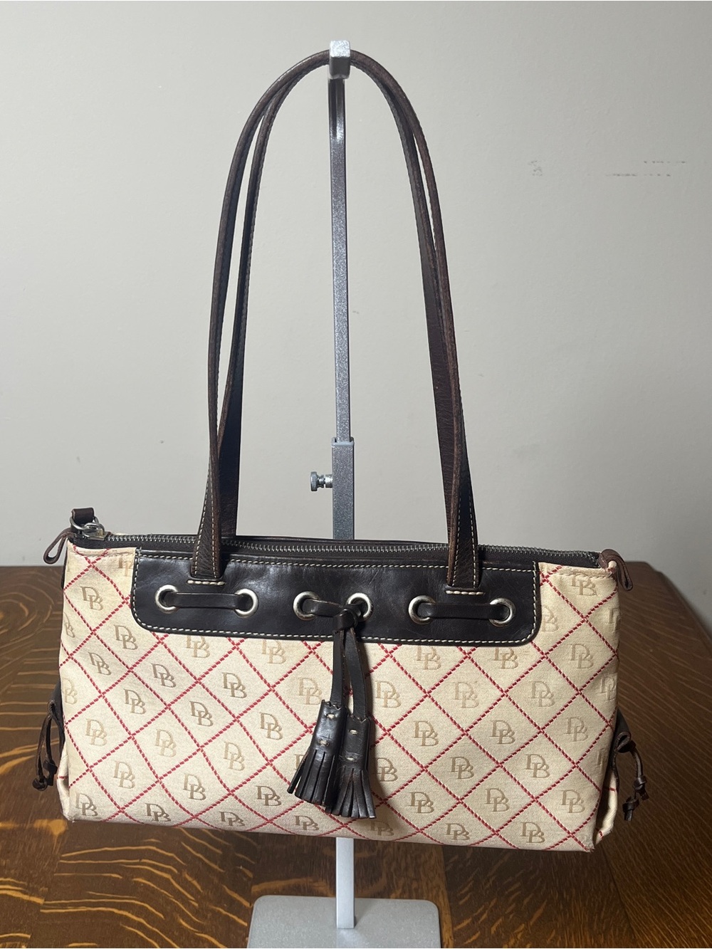 Dooney & Bourke Cream and Brown Logo Canvas Shoulder Bag with Tassel